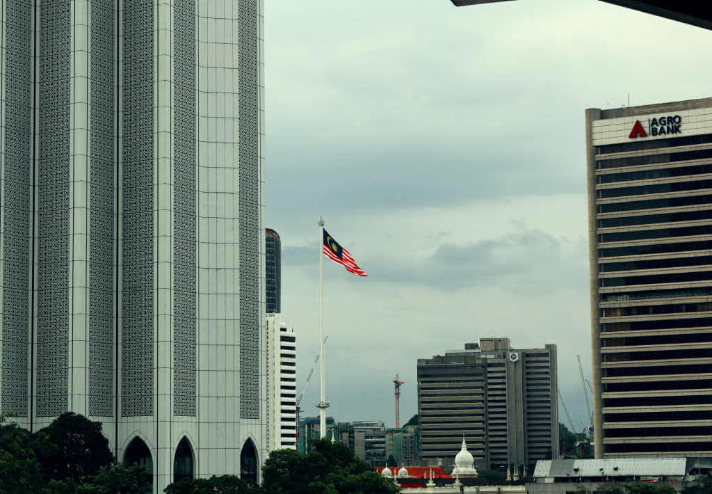 Flagpole in Kuala Lumpur - by Bari Abikar, Unsplash