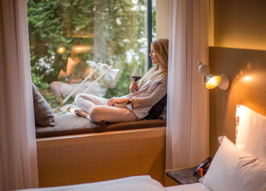 Enjoy the view from the cushioned window seat - by Booking