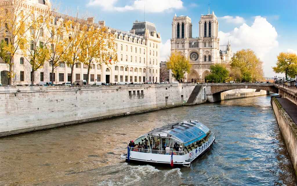 Combo Experience - Seine River Cruise + Disneyland Paris or Louvre Museum or Eiffel Tower Tickets - by Headout